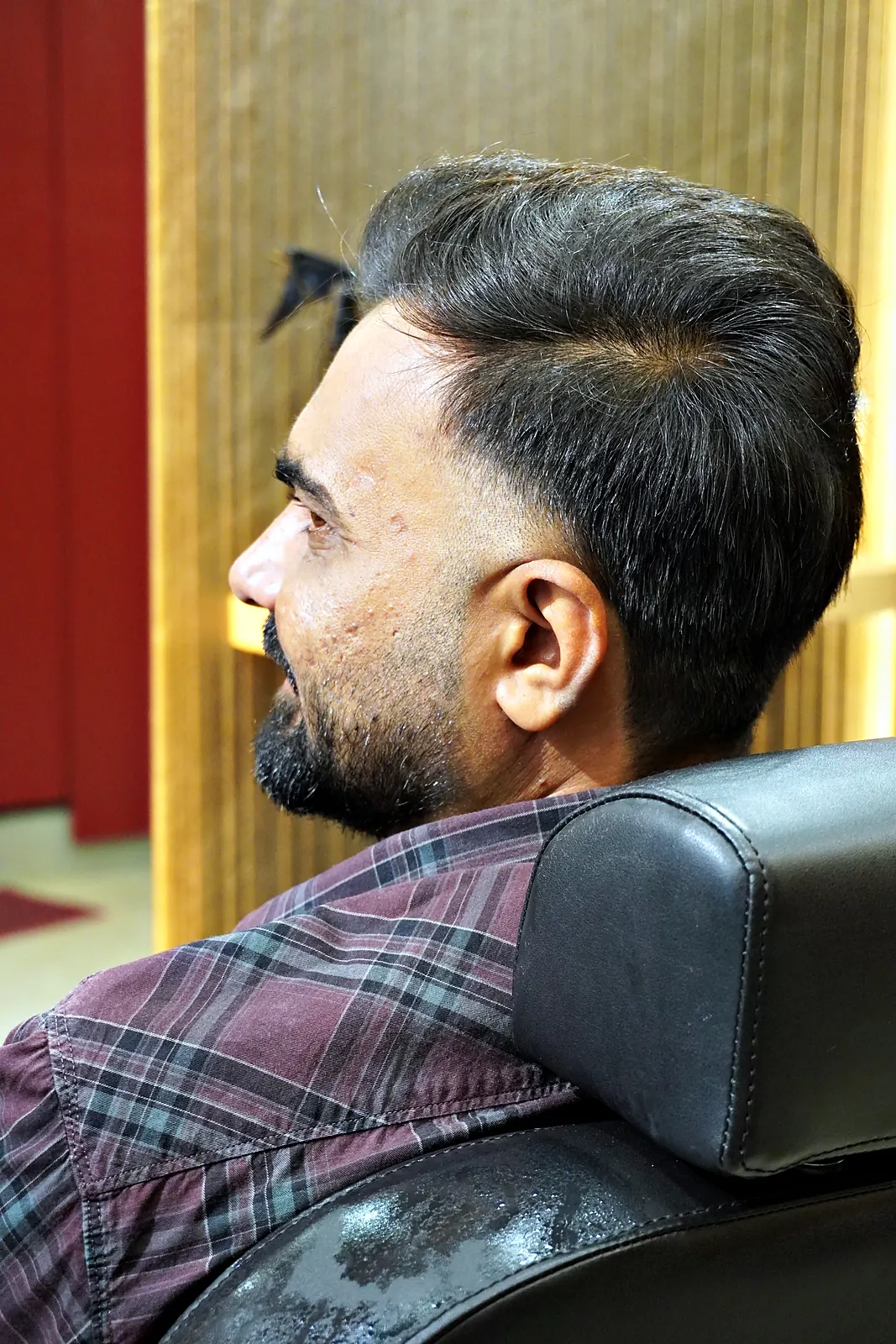 Side profile of a clean taper fade