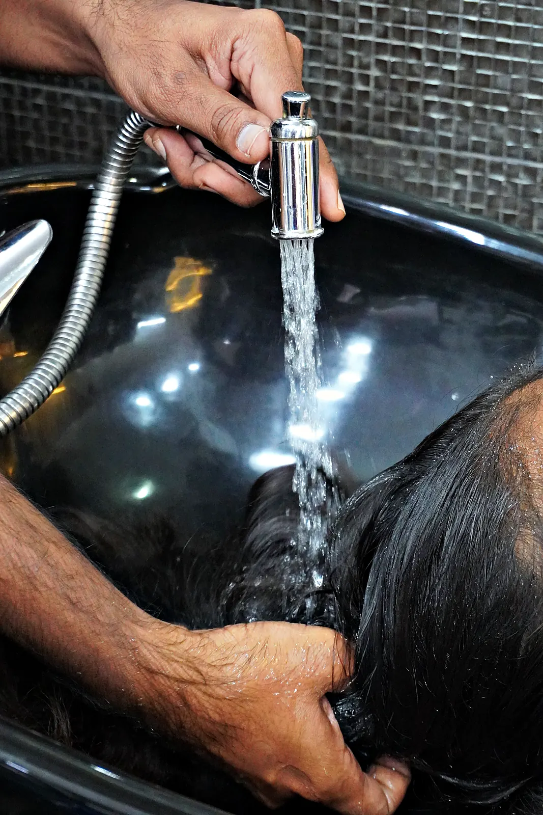 Warm water rinse at the wash station