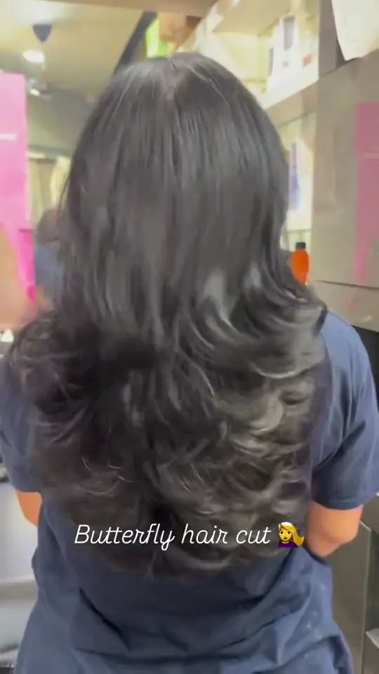 Butterfly haircut with face-framing layers